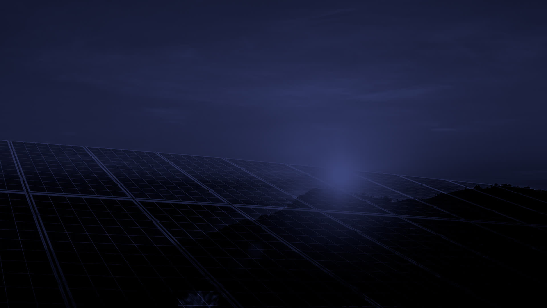 Ground-mounted solar park at dusk